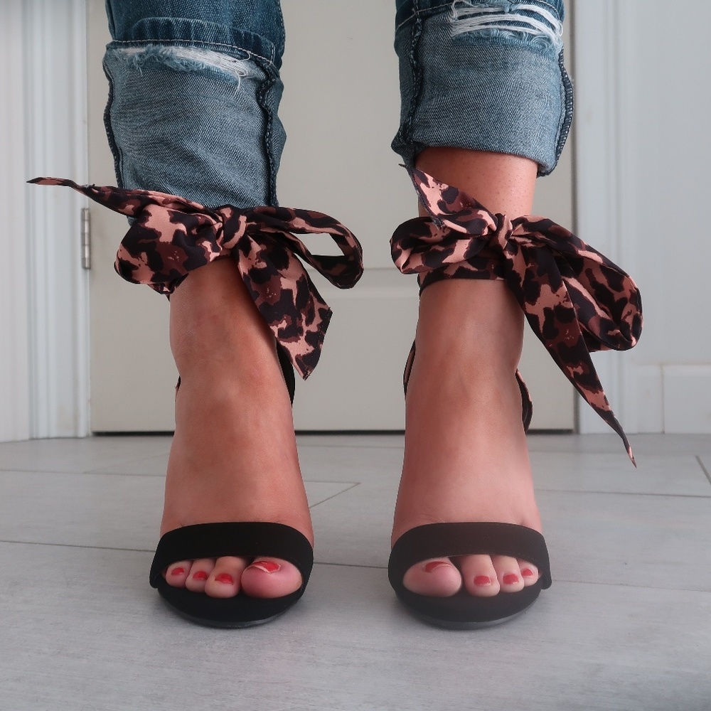 Black stiletto open-toe heels